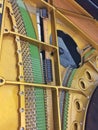 Inside piano close up colorful details yellow and green