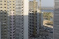 Inside place for many tall buildings under construction and cranes under a blue sky. Royalty Free Stock Photo