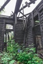 Inside room without roof in old abandoned wooden burned building Royalty Free Stock Photo