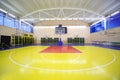 Inside school gym hall with red-yellow floor Royalty Free Stock Photo