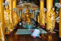 Inside a small temple at Shwedagon Pagoda in Yangon.