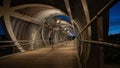 Inside the spectacular Arganzuela footbridge enclosed with spiraling metal design