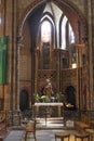 inside St. Faiths church with colorful windows in Selestat