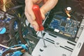 Inside system unit of computer, HDD is fixed with screw. Royalty Free Stock Photo