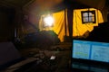 Inside the tent of the geological expedition. The work of the expedition in the forest, life inside the tent Royalty Free Stock Photo