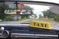 Inside a Typical Cuban Taxi, mirror reflection