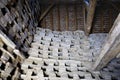 The inside of a very old dovecote, showing the ancient wooden beams and roof structure, and the dove nesting holes