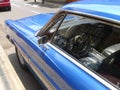 Inside view of a big size blue color Ford XL coupe