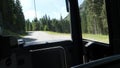 View from the bus of the winding mountain road leading to the famous ski resort in the Austrian Alps. Zauchensee, Austria