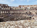 Inside view of the Colosseum with tourists during the day Royalty Free Stock Photo