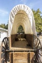Inside view of a covered wagon with wood bed and canvas top Royalty Free Stock Photo