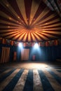 inside view of empty circus tent with spotlight