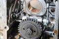 Inside view of a heavy-duty single-cylinder diesel engine with a focus on springs and gears Royalty Free Stock Photo