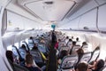 Inside view on passenger and cabin crew people on an airline airplane during flight vacation. Transportation tourism aviation