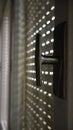 Inside view - Windows with old retro wooden shutters through which the sun`s rays penetrate Royalty Free Stock Photo