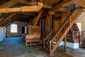 Interior of traditional mill with wooden equipment