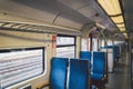 Inside The Wagon Train Germany, Dusseldorf. Empty train interior. interior view of corridor inside passenger trains with blue Royalty Free Stock Photo
