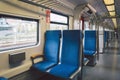 Inside The Wagon Train Germany, Dusseldorf. Empty train interior. interior view of corridor inside passenger trains with blue Royalty Free Stock Photo