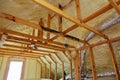 Inside wall insulation in wooden house, building under construction Royalty Free Stock Photo