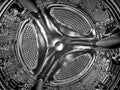 Inside of a washing machine drum Royalty Free Stock Photo