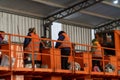 Inside a waste processing factory in Firmat, Santa Fe, Argentina with workers in orange vests