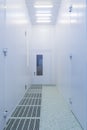 Inside white sterile clean room .Hallway with raised floor and door in clean room for pharmaceutical or electronic Royalty Free Stock Photo