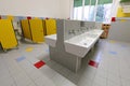 Inside a wide bathroom of kindergarten