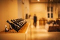 Inside the wine manufacture shop `Staatlicher Hofkeller WÃÂ¼rzburg`. With white and red wine in traditional round bottles