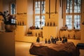 Inside the wine manufacture shop `Staatlicher Hofkeller WÃÂ¼rzburg`. With white and red wine in traditional round bottles