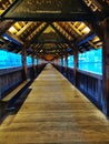 Inside wooden bridge wiyh blue light