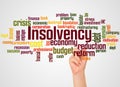 Insolvency word cloud and hand with marker concept Royalty Free Stock Photo