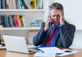 Insolvent businessman at phone