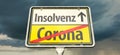 German place-name sign with the word `Corona` and the German word `Insolvenz` insolvency