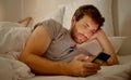 Insomnia, bored and social media in bed to destress and calm. Sleeping problems, anxiety and depression or smartphone