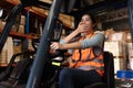 Insomnia Worker yawning feel sleepy while working in warehouse from hard work and sleepless