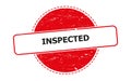 inspected stamp on white Royalty Free Stock Photo