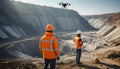 Inspecting Quarry with Drone Operation by Construction Workers Royalty Free Stock Photo