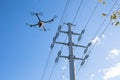 inspection and observation of electricity tower distribution with drone Royalty Free Stock Photo