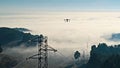 Inspection process of high-voltage towers with drones for maintenance Royalty Free Stock Photo