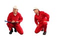 Inspector in red uniform and white hardhat at work