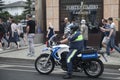 The inspector of the road police patrol on the service motorcycle controls the road