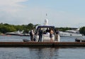 Inspector of the state Inspectorate for small vessels checks the crew of the motor yacht in the waters of the Khimki reservoir in