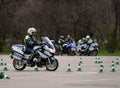 Inspectors of traffic police conduct training on extreme driving on official police motorcycles.