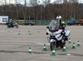 Inspectors of traffic police workout skills of extreme driving on official police motorcycles.