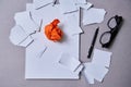 Inspiration, insight or good idea concept: a crumpled piece of orange paper Royalty Free Stock Photo