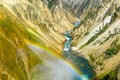 Inspiration point Yellowstone waterfall with rainbow