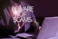 Inspiration showing sign Beware Of Scams. Internet Concept Stay alert to avoid fraud caution be always safe security Man