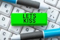 Inspiration showing sign Lets Kiss. Business approach Sign of love expressing emotions between couple