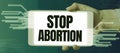 Inspiration showing sign Stop Abortion. Business idea prevent the uncontrolled growth of abnormal cells in the body