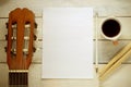 Inspirational background with a Spanish classical guitar on a wooden table Royalty Free Stock Photo